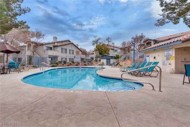 view of swimming pool featuring a patio