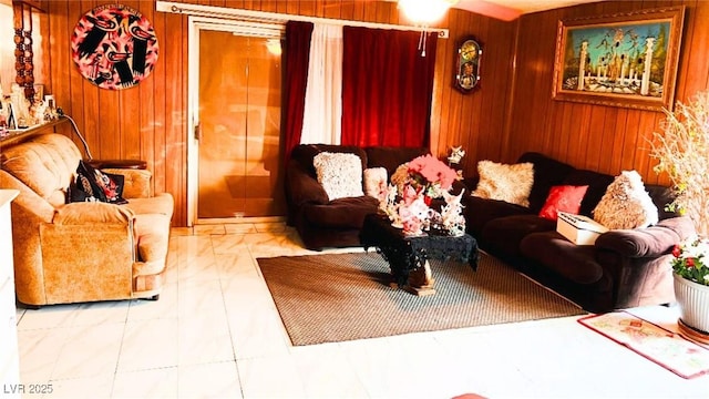 living room featuring wooden walls