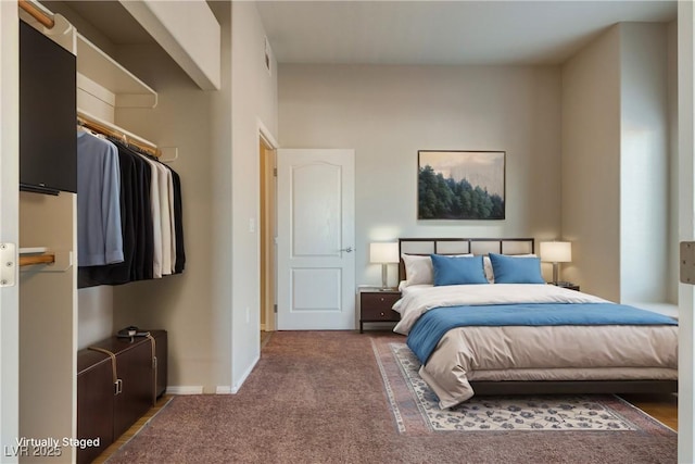 8805 Jeffreys St Unit 1115, Las Vegas, NV 89123 - carpeted bedroom featuring baseboards