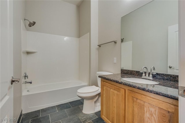 full bathroom featuring toilet, vanity, and bathtub / shower combination