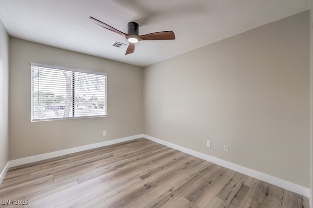 unfurnished room featuring ceiling fan and light hardwood / wood-style floors