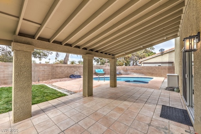 view of patio featuring a fenced in pool