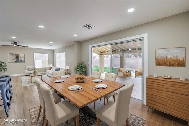 dining space featuring light hardwood / wood-style flooring