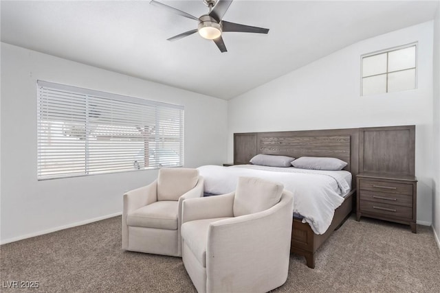 carpeted bedroom featuring ceiling fan and vaulted ceiling