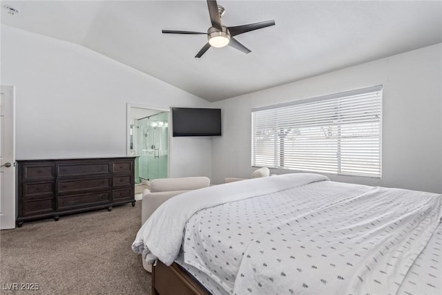 bedroom with ceiling fan, ensuite bath, lofted ceiling, and light colored carpet