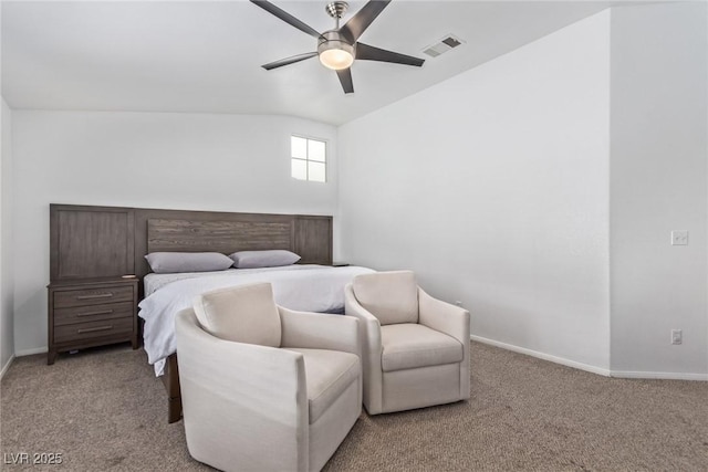 bedroom with ceiling fan, vaulted ceiling, and light carpet