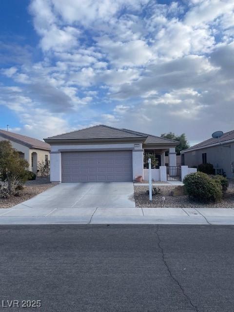 single story home featuring a garage