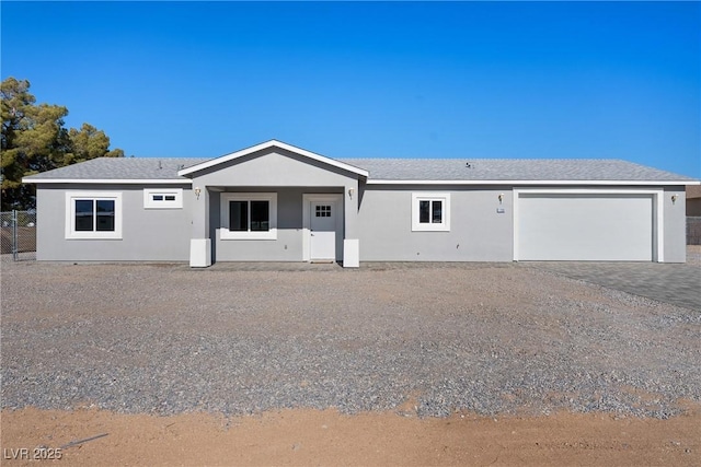 ranch-style house featuring a garage