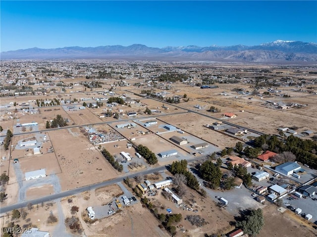 drone / aerial view featuring a mountain view