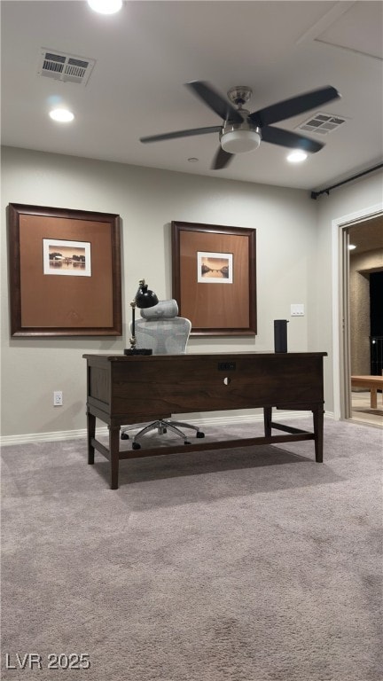 interior space featuring carpet and ceiling fan