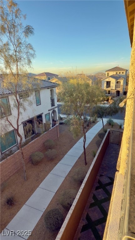 view of balcony at dusk