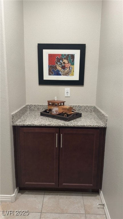 bathroom with tile patterned flooring