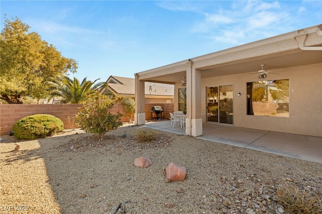 exterior space featuring ceiling fan and a patio area