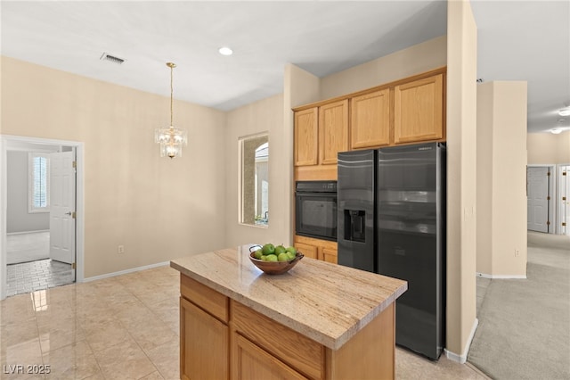 kitchen with light carpet, light brown cabinets, stainless steel fridge, a kitchen island, and oven