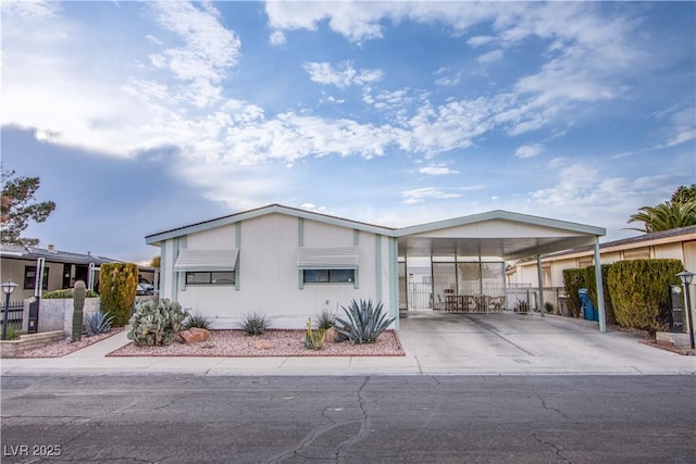 manufactured / mobile home with a carport