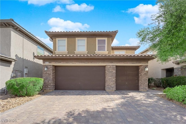 2033 Old Field Ave, North Las Vegas, NV 89081 - mediterranean / spanish-style house featuring stone siding, stucco siding, and a tiled roof