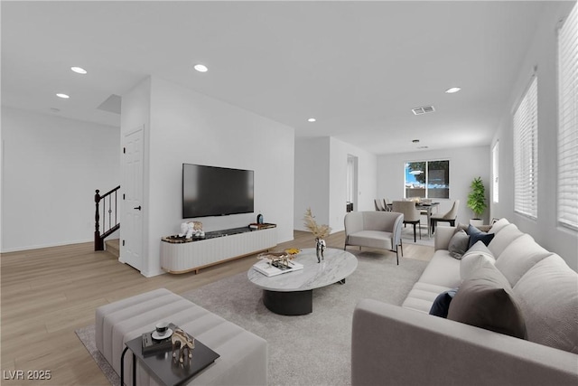 2033 Old Field Ave, North Las Vegas, NV 89081 - living room with light wood-style flooring, stairway, and recessed lighting