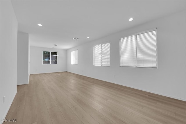 2033 Old Field Ave, North Las Vegas, NV 89081 - unfurnished room with light wood finished floors, recessed lighting, and baseboards