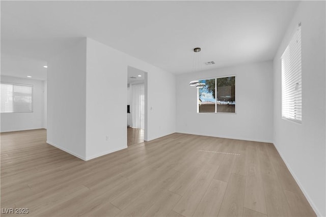 2033 Old Field Ave, North Las Vegas, NV 89081 - empty room featuring light wood-style flooring, plenty of natural light, recessed lighting, and baseboards