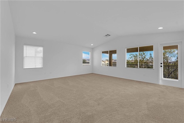 2033 Old Field Ave, North Las Vegas, NV 89081 - spare room with light colored carpet, lofted ceiling, and recessed lighting