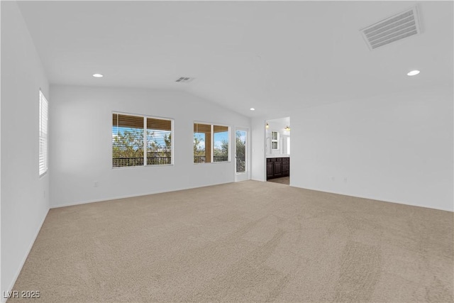 2033 Old Field Ave, North Las Vegas, NV 89081 - unfurnished living room featuring carpet, lofted ceiling, and recessed lighting