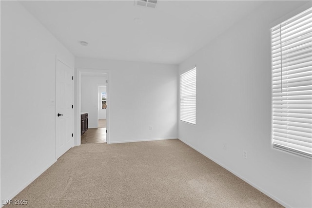 2033 Old Field Ave, North Las Vegas, NV 89081 - spare room with light carpet and baseboards