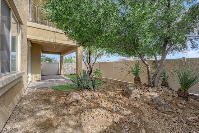 2033 Old Field Ave, North Las Vegas, NV 89081 - fenced backyard featuring a patio