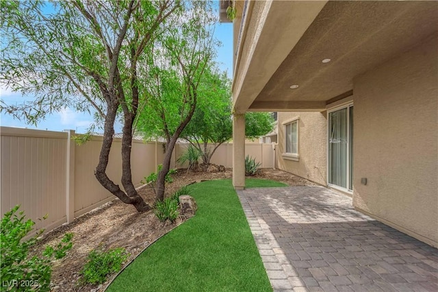 2033 Old Field Ave, North Las Vegas, NV 89081 - view of yard featuring a patio