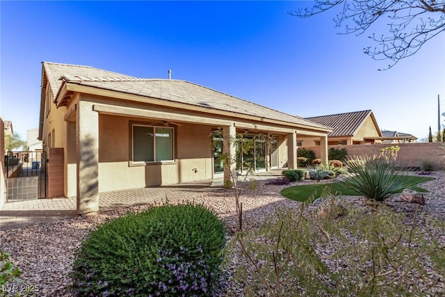 rear view of house featuring a patio area