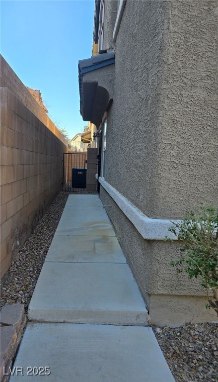 view of home's exterior featuring central AC