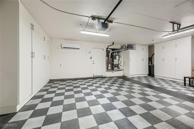 garage with a garage door opener and a wall unit AC