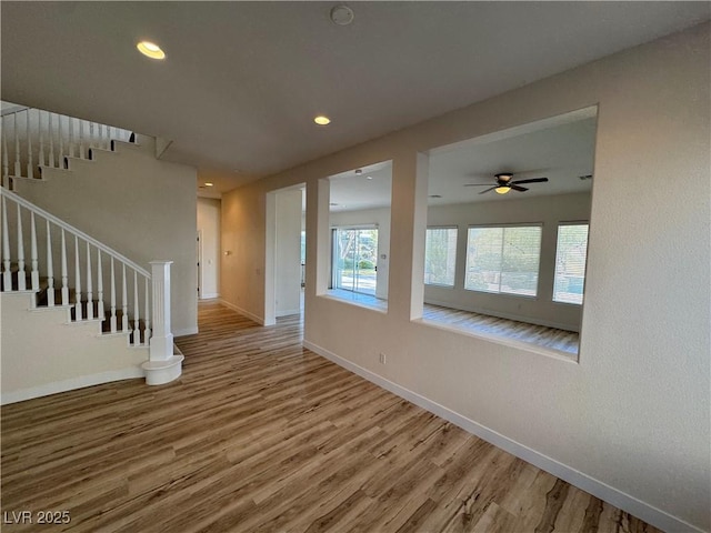 unfurnished living room with hardwood / wood-style floors