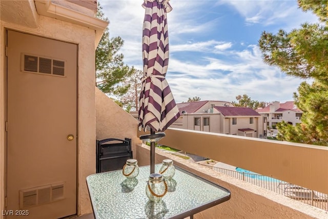 balcony featuring visible vents