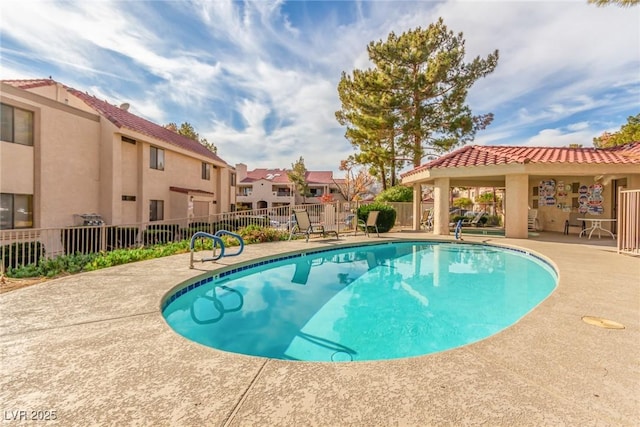 view of pool featuring a patio area