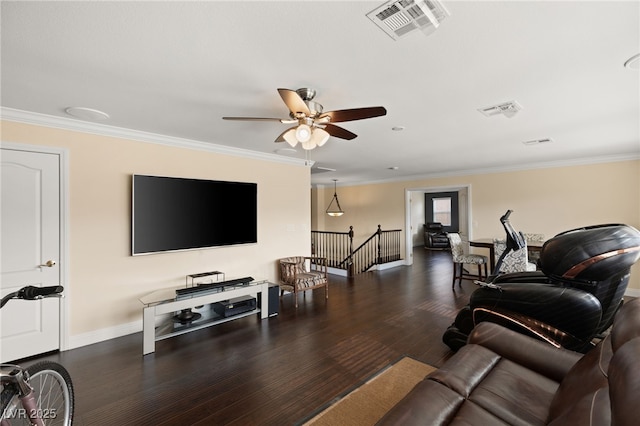 living room featuring crown molding, ceiling fan, and dark wood-type flooring