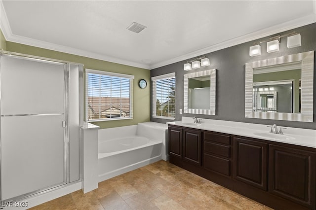 bathroom with crown molding, vanity, plus walk in shower, and tile patterned flooring