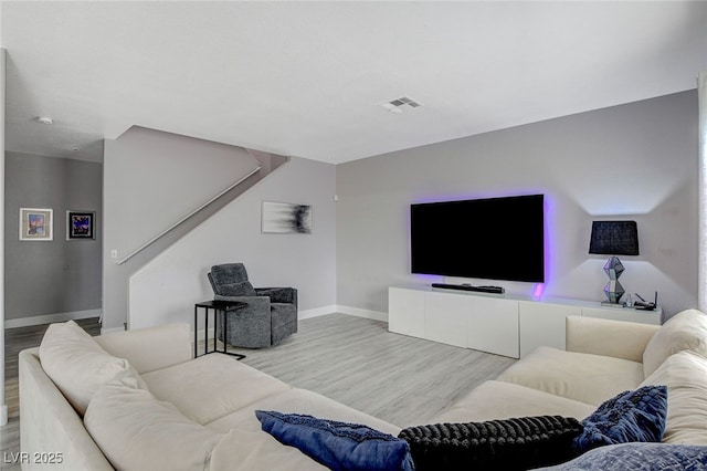 living room featuring light wood-type flooring