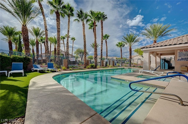 view of swimming pool with a patio area