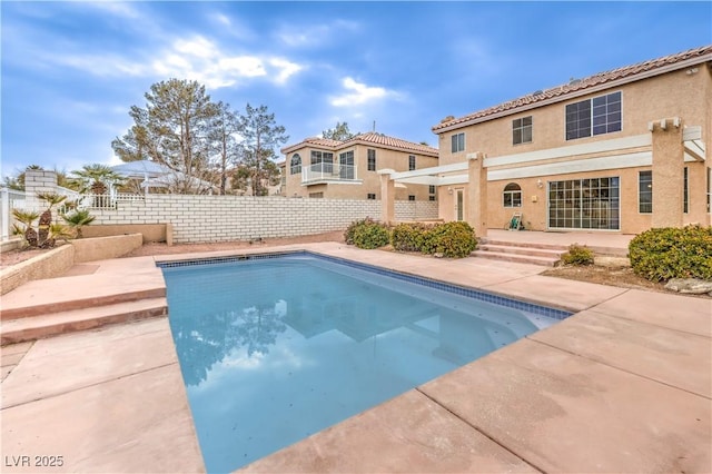 view of swimming pool featuring a patio