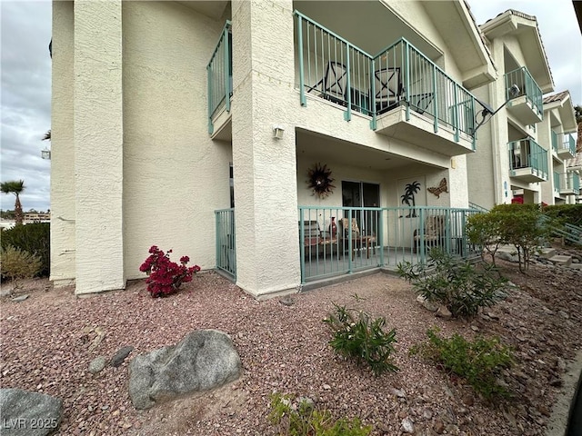 exterior space featuring a balcony