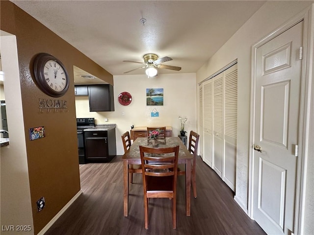 dining room featuring ceiling fan and dark hardwood / wood-style flooring