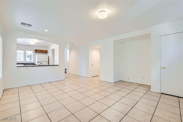 view of tiled spare room