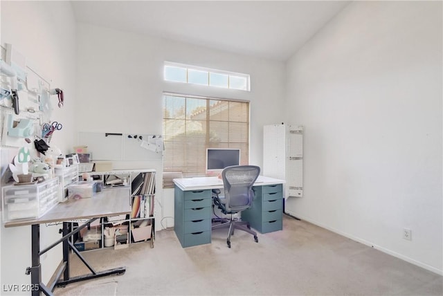 home office featuring light colored carpet