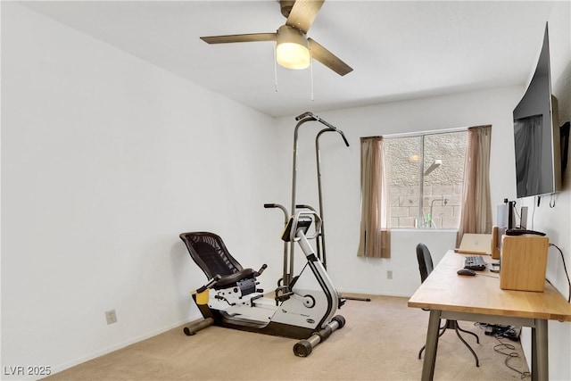 office space with light colored carpet and ceiling fan