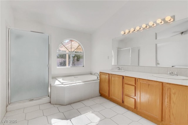 bathroom featuring vanity and plus walk in shower