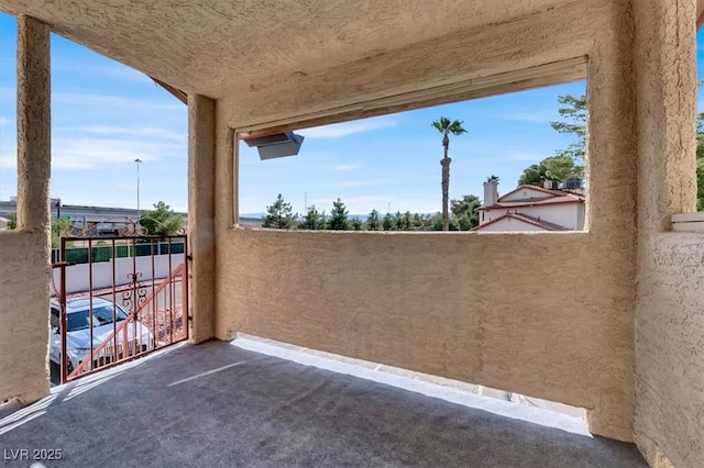 view of patio with a balcony