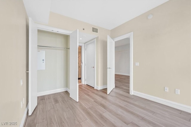 2700 Las Vegas Blvd Unit 3105, Las Vegas, NV 89109 - unfurnished bedroom with light wood finished floors and a closet