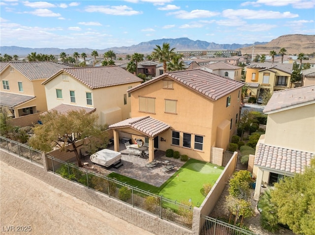 birds eye view of property featuring a mountain view