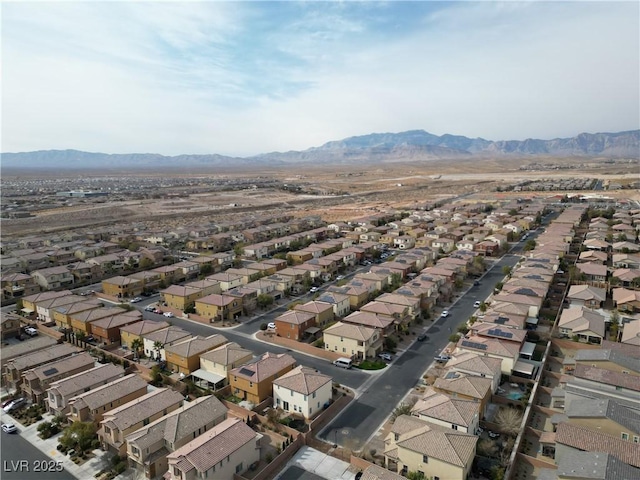 drone / aerial view featuring a mountain view