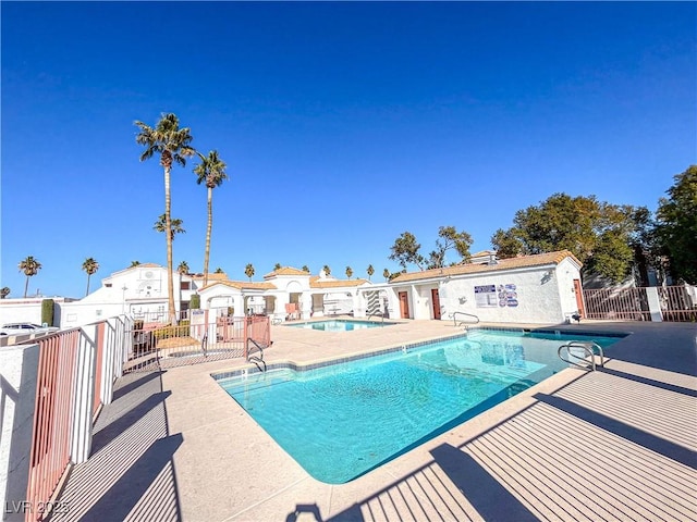 view of pool featuring a patio